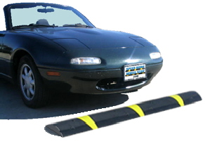 Speed Bumps, Speed Humps, Wheel Stops (Car Stops) & Wheel Chocks (chox). Factory Authorized Distributor / Dealer of recycled rubber and plastic traffic controls for parking lots, intersections, drive through restaurants, gates, barrier gate operators, bicycles and pedestrian control products. Competitive pricing on other traffic controls at discount.
